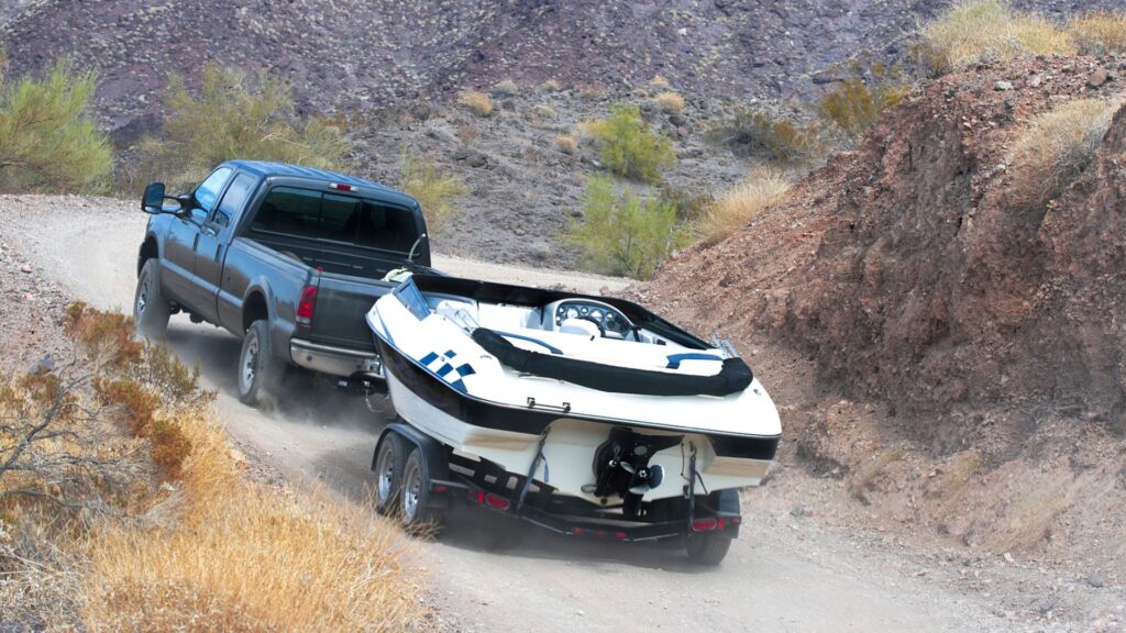 truck towing boat